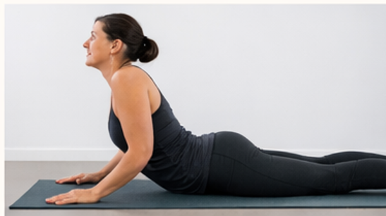 person performing McKenzie exercise on elbows